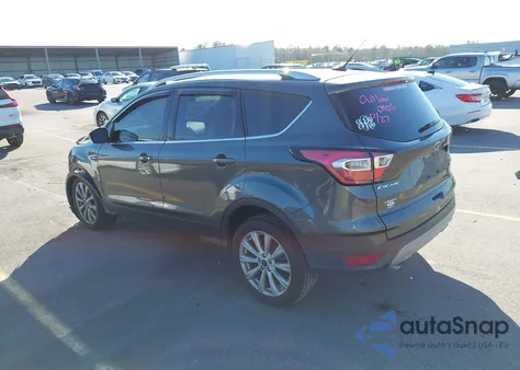 2017 Ford Escape Titanium z USA, uszkodzony, nr VIN 1FMCU0J95HUF01691